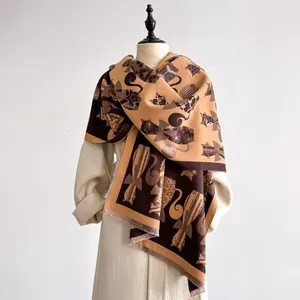 Macro detail of abstract cat jacquard weave and soft fringe on the pashmina scarf
