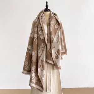 Double-sided jacquard cashmere-feel scarf with abstract cat and geometric patterns