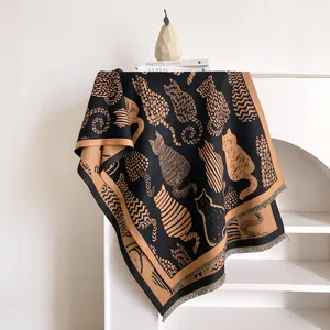 Abstract cat jacquard knit shawl with tassels in black and camel colors for winter