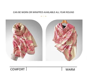 Detail of pink toile de jouy pattern on cashmere shawl with delicate fringe edges