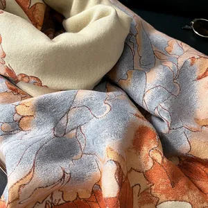 Macro detail of elegant peony jacquard weaving with warm orange and grey floral textures