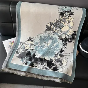 Elegant peony floral jacquard pashmina shawl with tassel fringe on black leather sofa