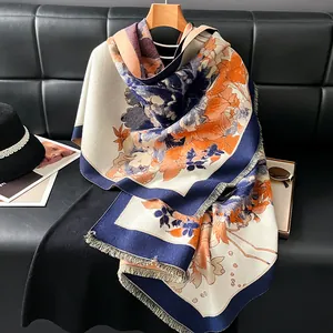 Elegant floral cashmere-feel shawl with peony jacquard patterns and tassels in vibrant orange