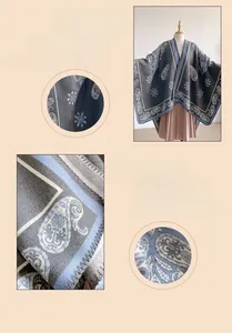 Detail of grey jacquard shawl with blue paisley patterns and soft knit texture