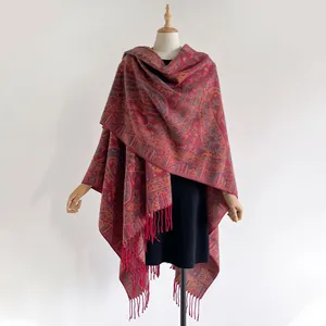 Ethnic paisley shawl wrap with fringe tassel detail for travel and vacation wear