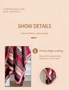 Detail of bohemian shawl featuring precise overlock stitching and red ethnic pattern