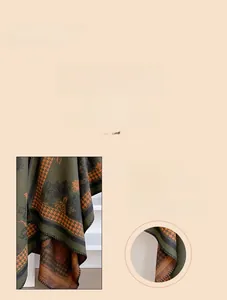 Macro detail of the floral houndstooth scarf showing premium stitching and fabric edges