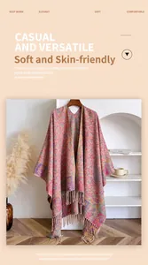 Close-up of floral cashmere jacquard shawl with bohemian fringe and ethnic patterns