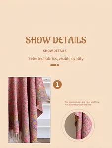 Detailed close-up of exquisite lock-stitching and bohemian floral patterns on pink scarf