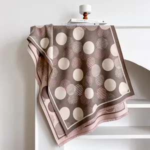 Elegant geometric polka dot cashmere-feel shawl with fringe in brown and pink tones