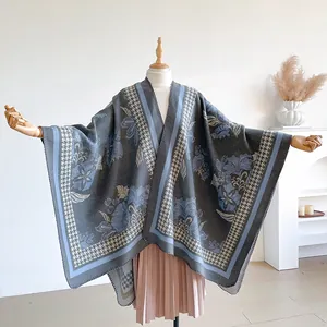 Floral and houndstooth thick knit shawl for women with blue patterns and grey trim