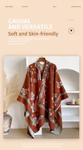 Detail of warm winter floral cashmere-like shawl poncho in retro bohemian style