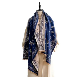 Blue and beige paisley print oversized scarf with fringe trim for winter