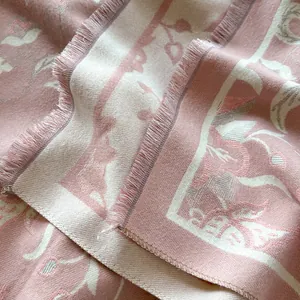 Ethnic floral jacquard scarf shawl in pink and beige with decorative fringed edges