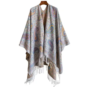 Ethnic paisley cashmere shawl with fringe trim for desert travel and boho styling