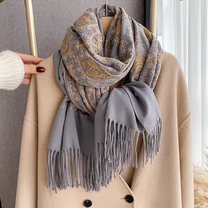 Grey cashmere-like scarf with gold flower embroidery and tassel fringe for winter