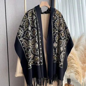 Black cashmere-feel shawl with gold floral embroidery and tassels for winter warmth