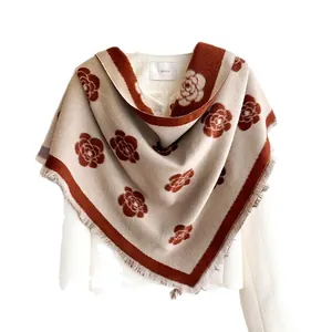 Oatmeal and caramel striped camellia knit shawl with fringe for winter warmth