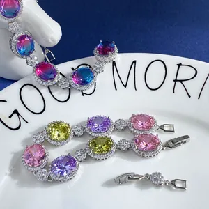 Sparkling gradient zircon bracelet with oval gemstones and halo diamond accents for women