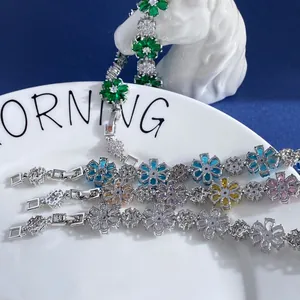 Macro detail of multi-colored floral zircon bracelets with secure folding clasps
