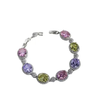 Elegant silver bracelet with pink purple and green oval gemstones and cubic zirconia