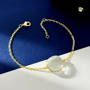 Elegant gold chain bracelet featuring a square clear crystal charm with lobster clasp