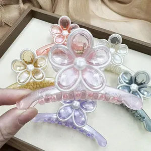 Mollette per capelli a forma di fiore perlato con perla centrale in vari colori
