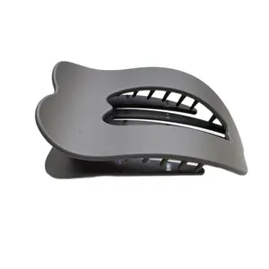 Minimalist matte dark grey heart-shaped hair claw clip with wave curved design