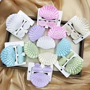 Set di fermagli per capelli a conchiglia in colori pastello con trama a rilievo