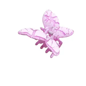Pince à cheveux papillon rose et violette avec motifs marbrés blancs pour femmes