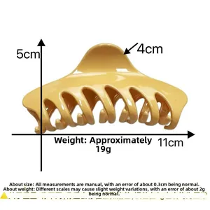 Detailed size specifications for the yellow claw clip showing 11cm length and 5cm height