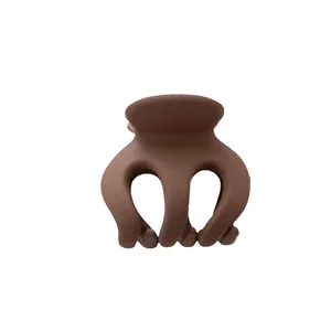 Pince à cheveux citrouille marron mat pour coiffures élégantes et queues de cheval