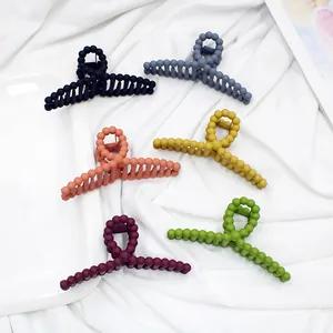 Matte finish candy color hair claws in six vibrant shades for minimalist styling