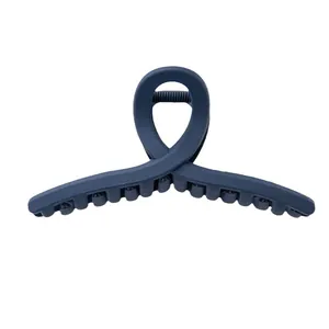Pinza per capelli blu scuro opaco per coda di cavallo alta con design minimalista