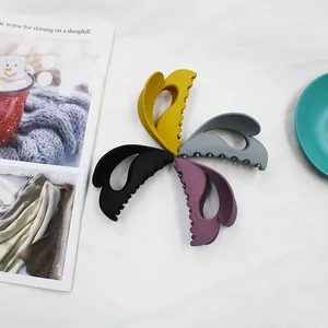 Set di quattro mollette opache in giallo, grigio, nero e viola per capelli folti