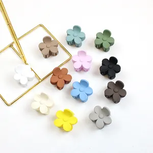 Matte five-petal flower hair claw clips in twelve assorted colors for elegant styling