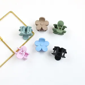 Matte five-petal flower hair clips in six colors with a minimalist aesthetic style