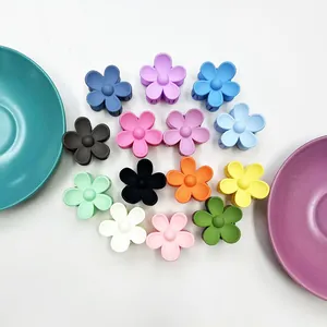 Set of 13 colorful 3.5cm matte macaron flower hair claws with a stylish frosted finish