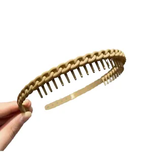 Beige matte chain-link headband with inner teeth for secure non-slip hair styling