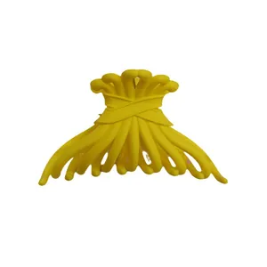 Matte yellow octopus style hair claw clip for thick hair styling and secure grip