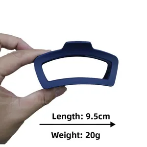 Detail view of 9.5cm dark blue matte hair claw clip with dimensions and weight info