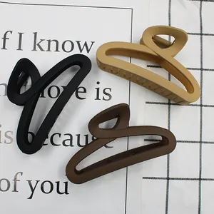 Set of 3 matte hollow hair claws in black, khaki and brown for daily hair styling