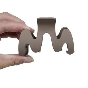 Minimalist 9cm matte brown wave-shaped hair claw clip for women's thick hair styling