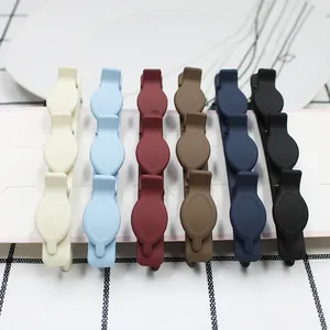 Set of 6 minimalist matte duckbill hair clips in various Morandi colors on display card