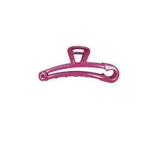 Chic magenta safety pin style hair claw clip with a glossy candy-colored finish