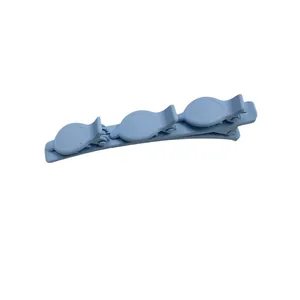 Light blue matte hair clip with three mini clips for braided hair styling on white background