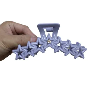 Lavender purple star-shaped claw clip made of glossy resin for daily hair styling
