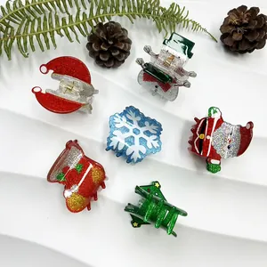 6-piece festive Christmas hair claw clip set with glittery Santa and snowflake designs