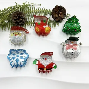 Glittery Christmas hair claw clips set featuring Santa, Snowman, and Tree designs