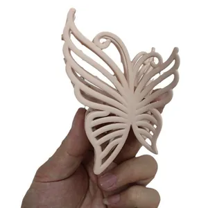 Matte butterfly hair claw clip in nude pink with hollow wings for elegant hairstyles